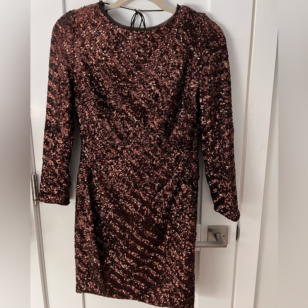 Julian Joyce by Mandalay sequined long sleeve, backless cocktail dress.